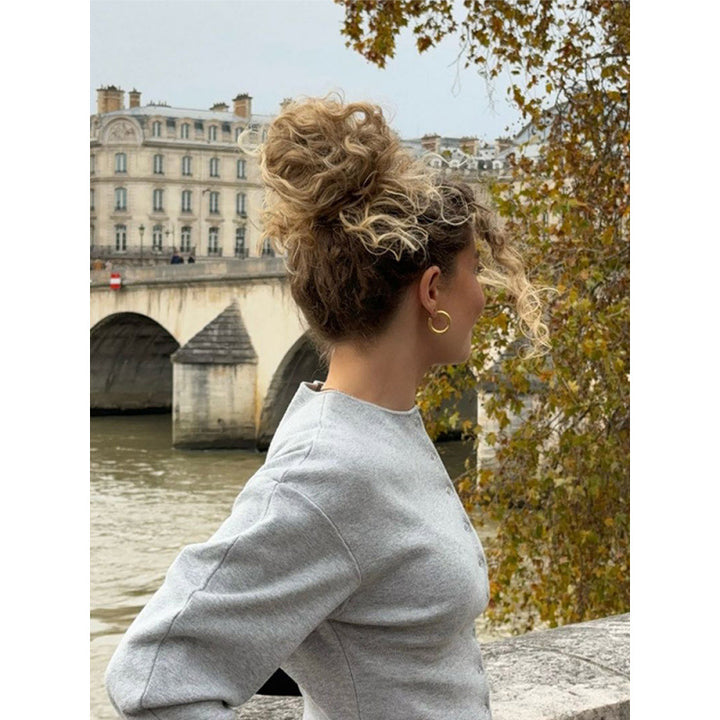 Trendy knit jacket for women with pleated sleeves and chic and stylish button details