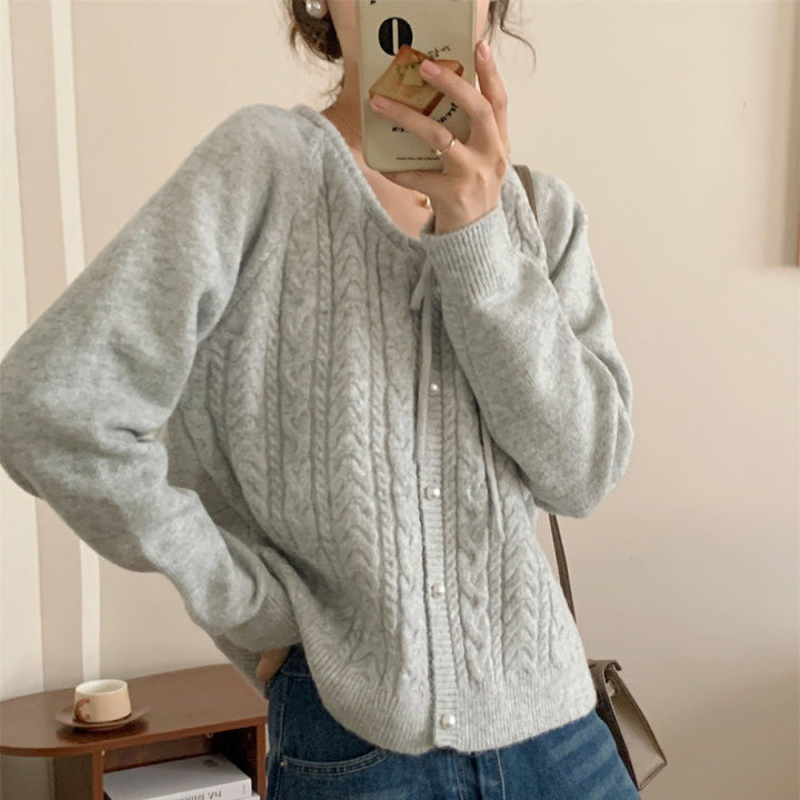 Chunky knit jacket for women with elegant pearl buttons and a structured design Lune London