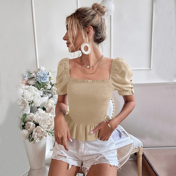 Blouse raffinée pour dames avec manches bouffantes et ourlet élastique Chic & Stil