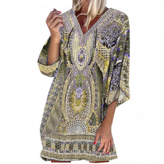 Light kaftan dress for women with a deep V-neckline and bell sleeves Lune London