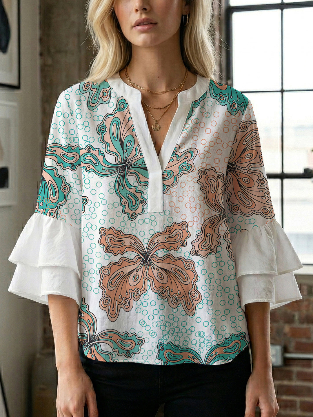 Women's blouse with voluminous ruffle sleeves and creative floral design Lune London