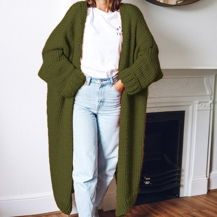 Women Large knitted coat with deep pockets and voluminous sleeves Lune London
