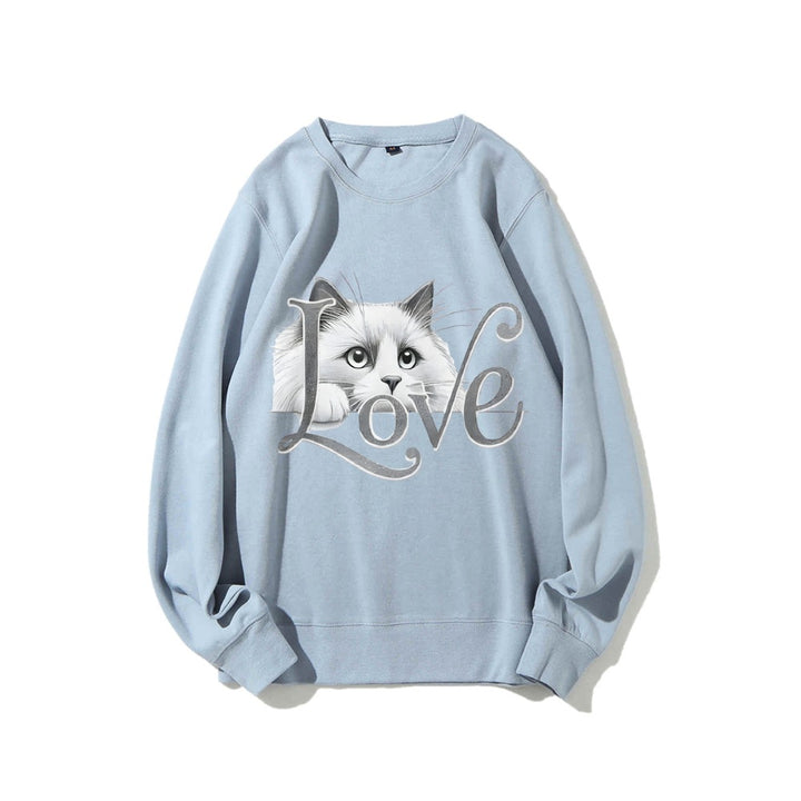 Sweat-shirt pour femmes avec un design de chat ludique et une coupe décontractée Chic & Stil