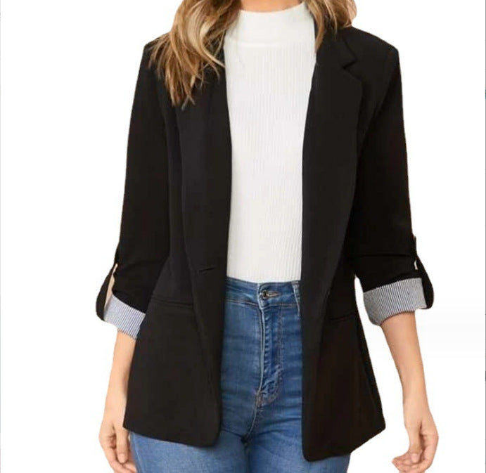 Fashionable women's blazer with roll-up sleeves and textured details Lune London