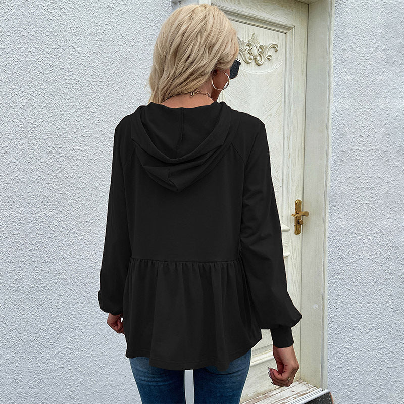 Casual hooded blouse for women with asymmetric cut and ruffle details Lune London