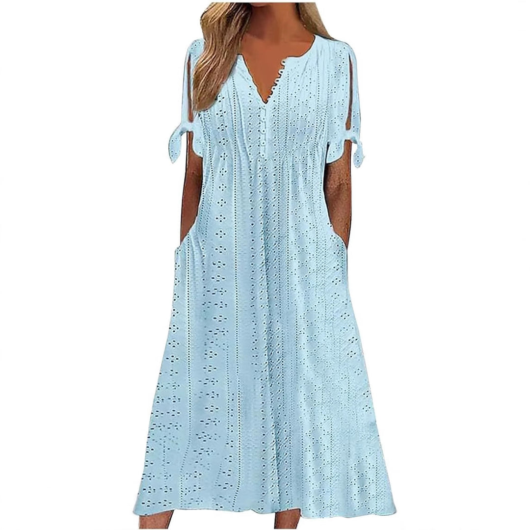 Airy midi dress for women with decorative hole patterns and practical pockets Lune London