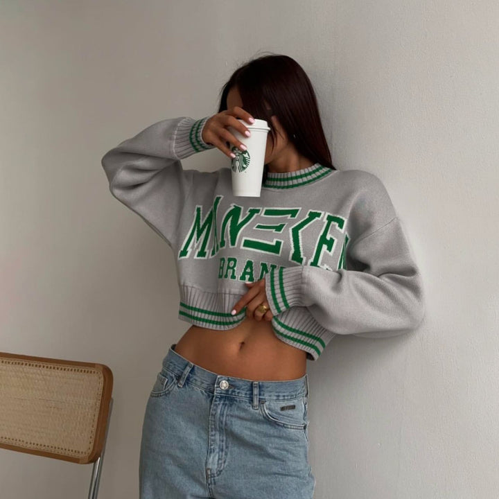 Ladies trendy, casual Crop-Sweater with graphic text and chic sports accents