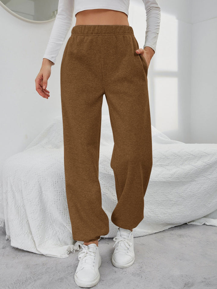 Pantalons de survêtement décontractés pour femmes avec taille élastique et poches latérales Chic & Stil