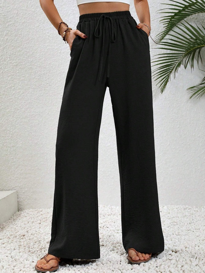 Casual palazzo pants for women with elastic waistband and practical pockets Lune London