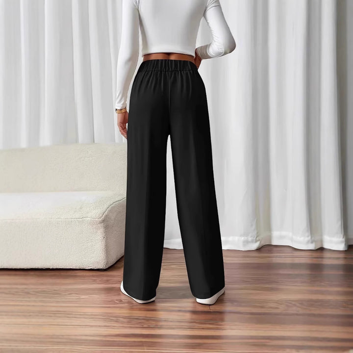 High-waisted palazzo pants for women with side pockets and decorative button details Lune London