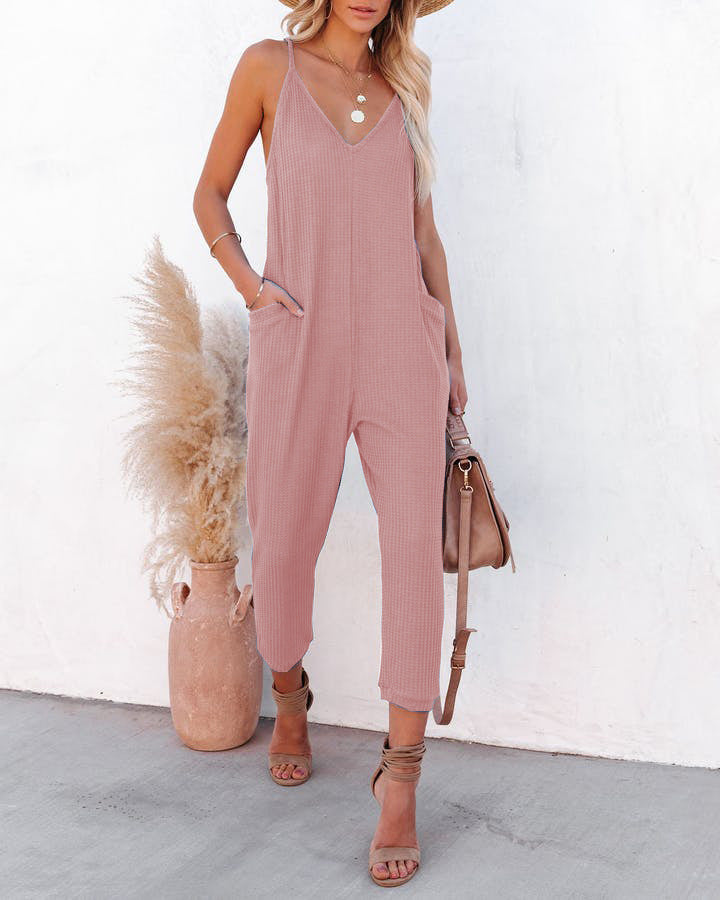 Ladies casual jumpsuit with deep V-neck and practical side pockets Lune London