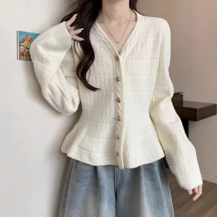 Ladies elegant cardigan with textured design and feminine puff sleeves Lune London