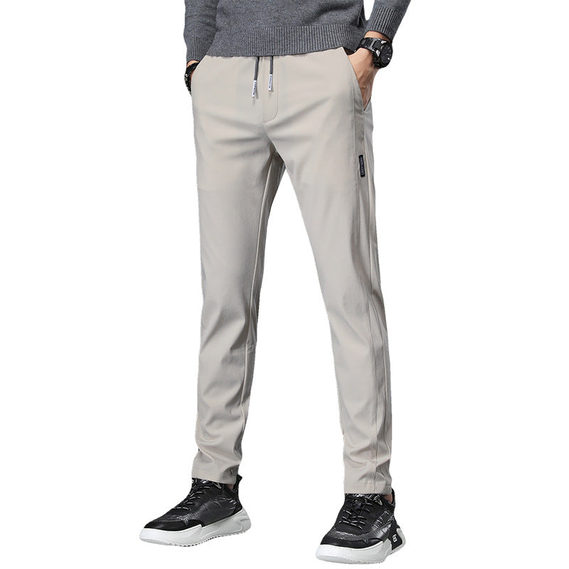 Men's slim fit sports pants with elastic waistband and practical zip pockets Lune London