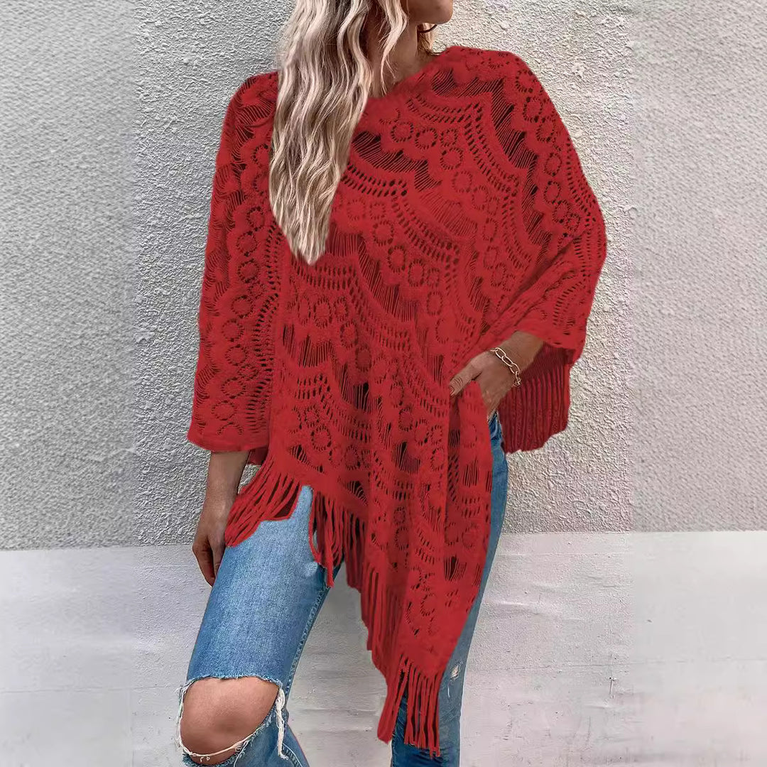 Ladies knitted poncho with chic and stylish fringed design