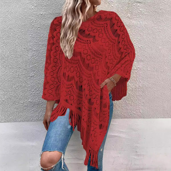 Ladies knitted poncho with chic and stylish fringed design