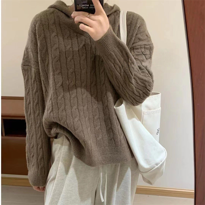 Pull tricoté confortable pour femmes avec capuche et motif en cable Chic & Stil
