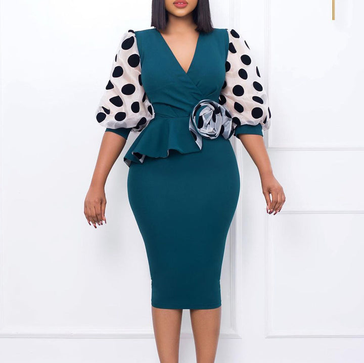 Fitted cocktail dress for women with sheer puff sleeves and floral accent Lune London
