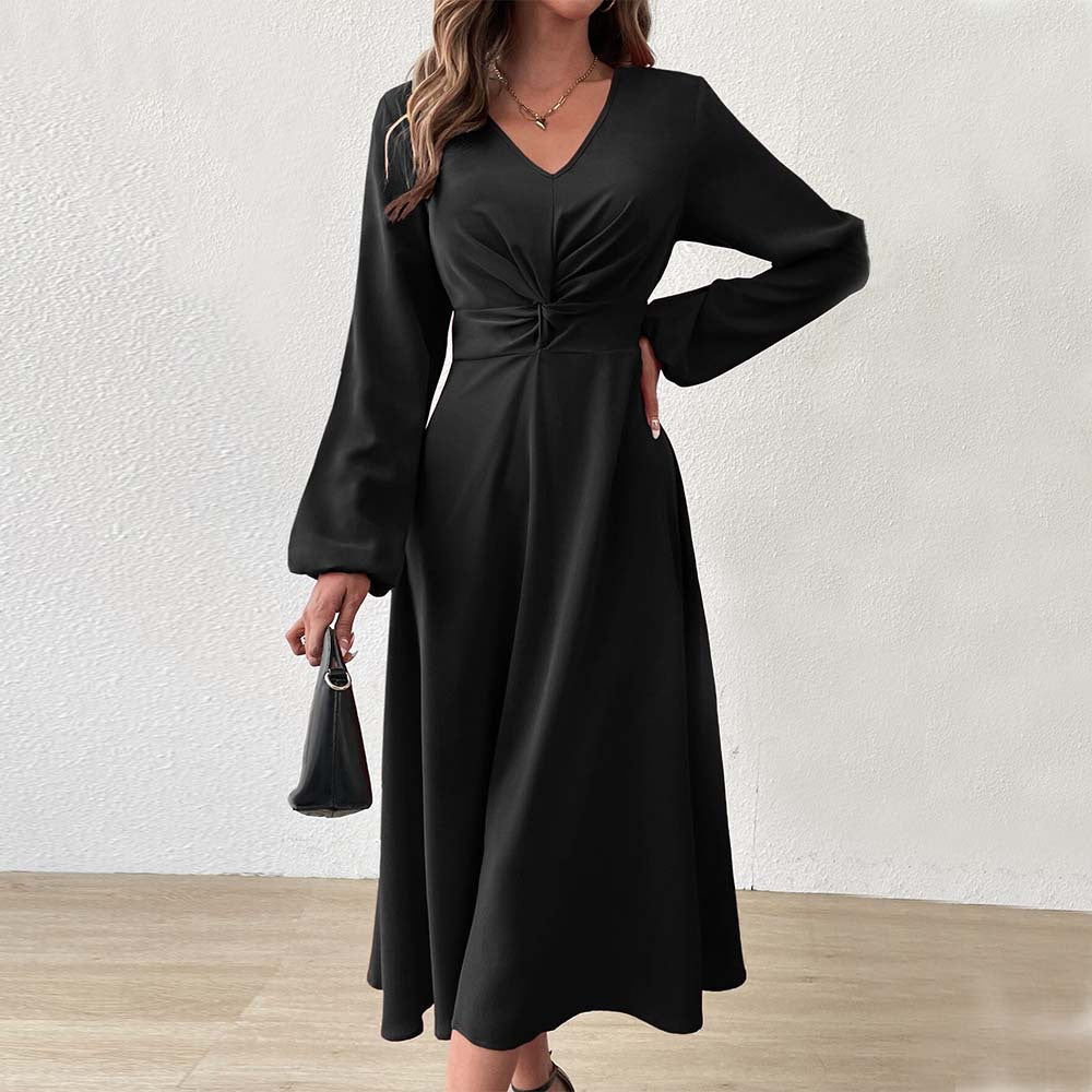 Elegant midi dress for women with a flattering drape and a deep V-neck Chic & Stil