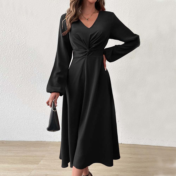 Elegant midi dress for women with a flattering drape and a deep V-neck Chic & Stil