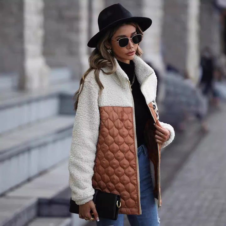 Women's fleece jacket with modern patchwork details and a chic animal print