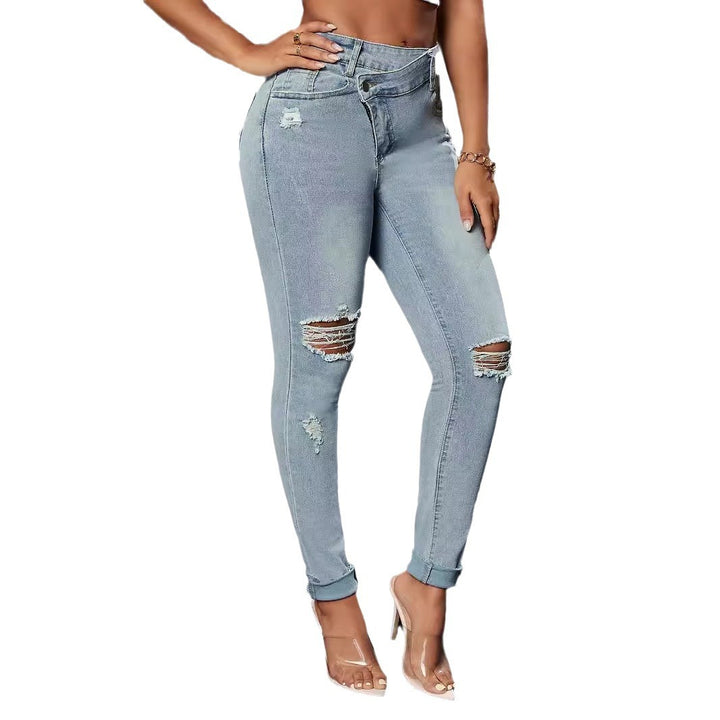 Jean pour femme taille haute au look déchiré avec une coupe ajustée Chic & Stil