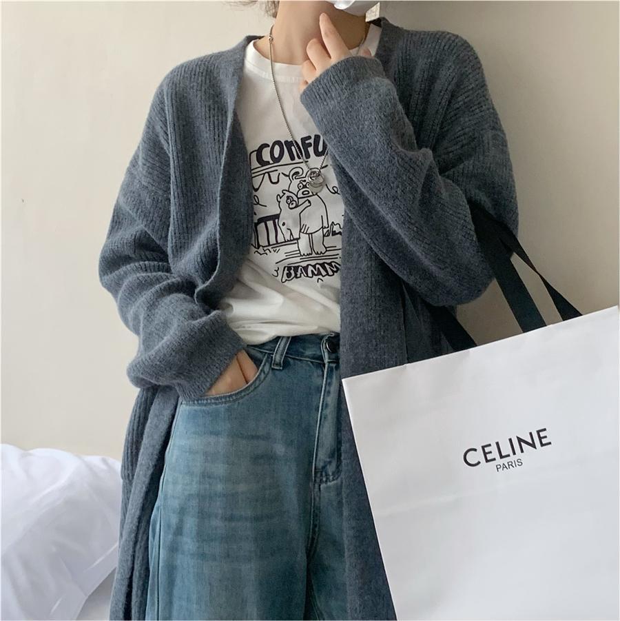 Manteau tricoté pour femmes avec ouvertures et poches spacieuses Chic & Stil