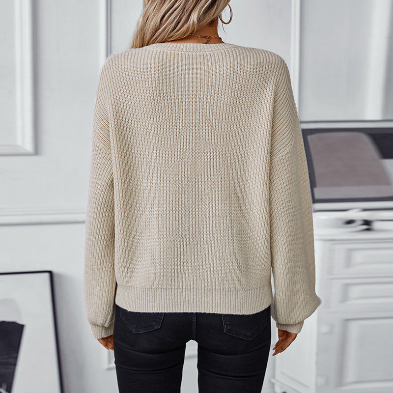 Knit sweater for women with V-neck and decorative textured pattern Lune London