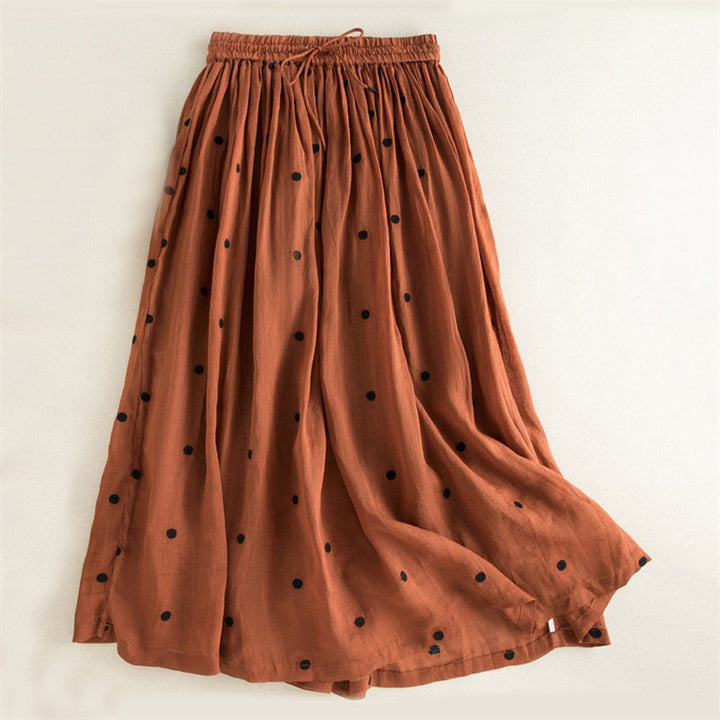 Ladies long and light skirt with elastic waistband and polka dot design Lune London