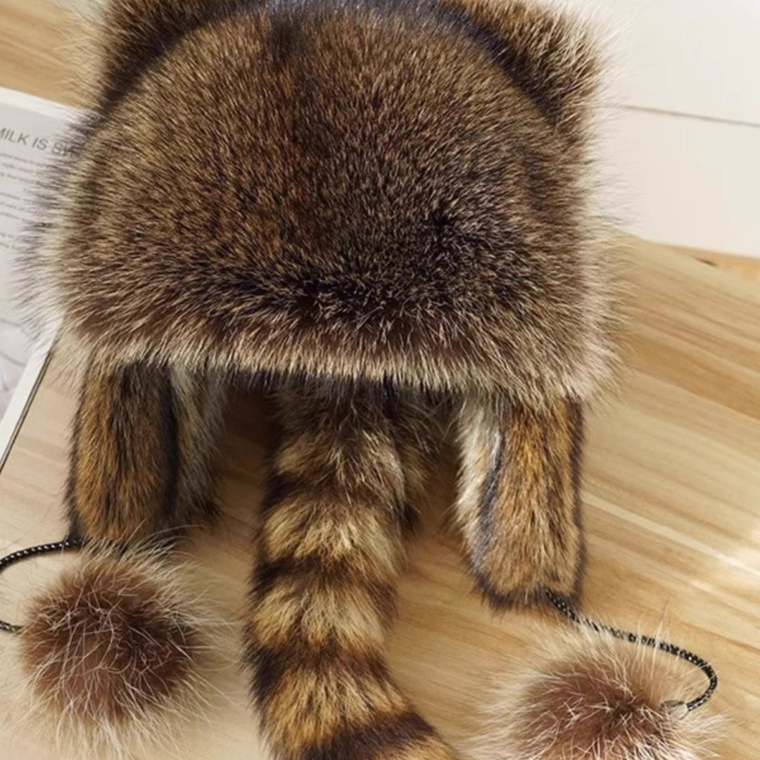 Ladies fashionable fur cap with ear protection and pom-poms Lune London
