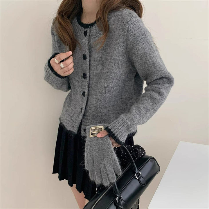 Ladies cozy knit vest with heart-shaped buttons and refined sleeve design Lune London
