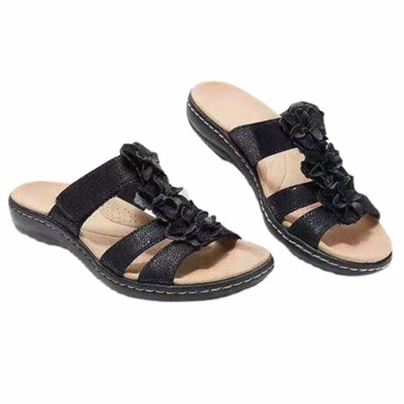 Women’s sandals with floral accent Lune London