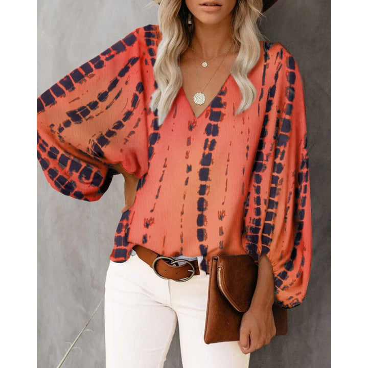 Blouse féminine à la mode avec des manches larges et un col en V Chic & Stil