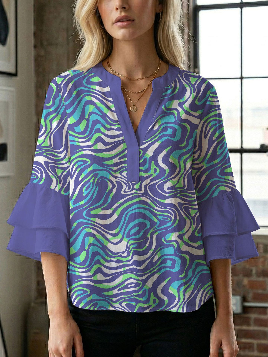 Women's blouse with voluminous wing sleeves and intense leaf pattern Lune London