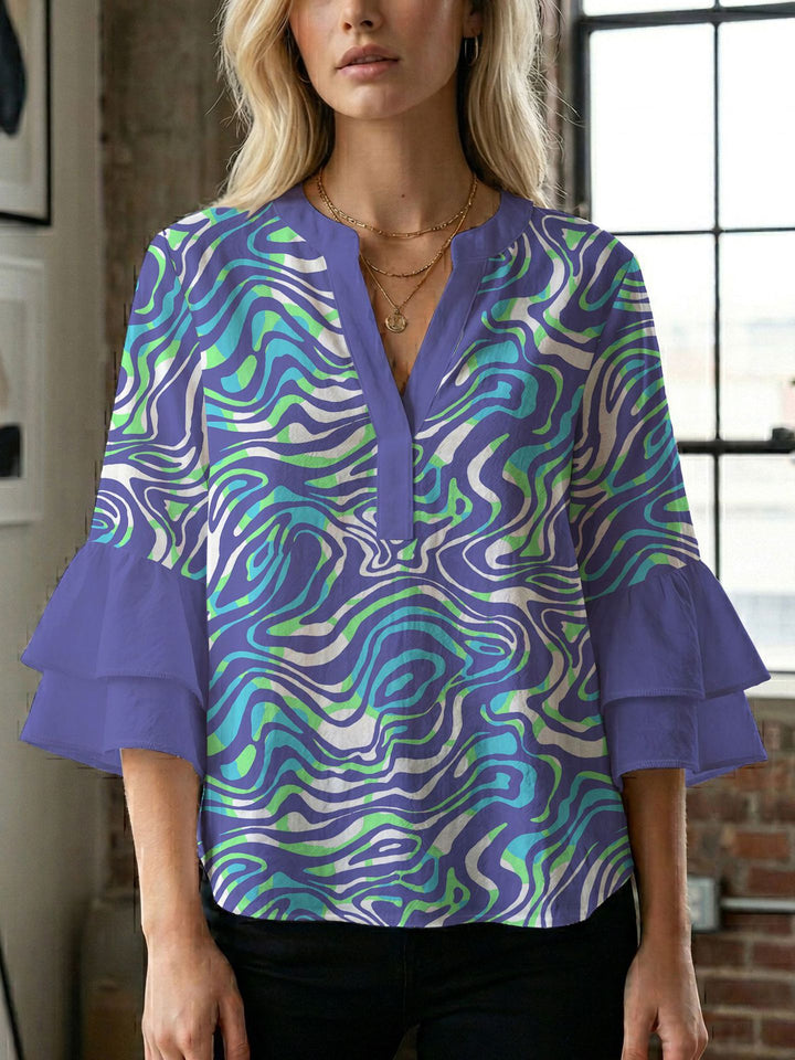 Women's blouse with voluminous wing sleeves and intense leaf pattern Lune London