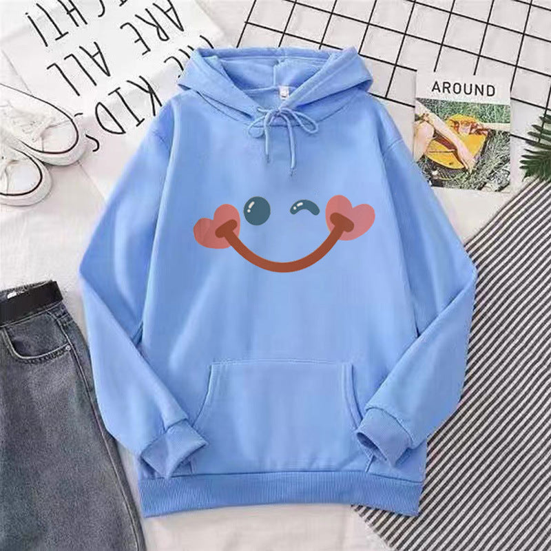 Women's hoodie with cheerful smiley design Chic & Stil