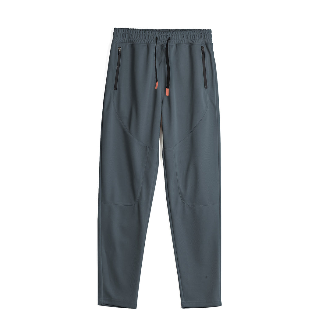 Men's sporty jogging pants with an innovative breathable structure and practical zippered pockets Lune London