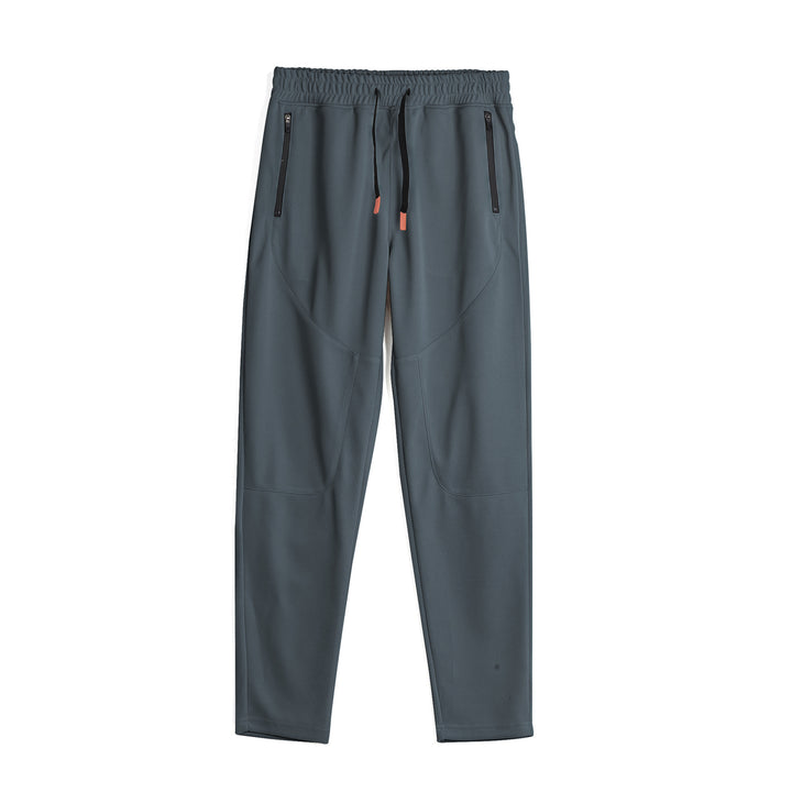 Men's sporty jogging pants with an innovative breathable structure and practical zippered pockets Lune London