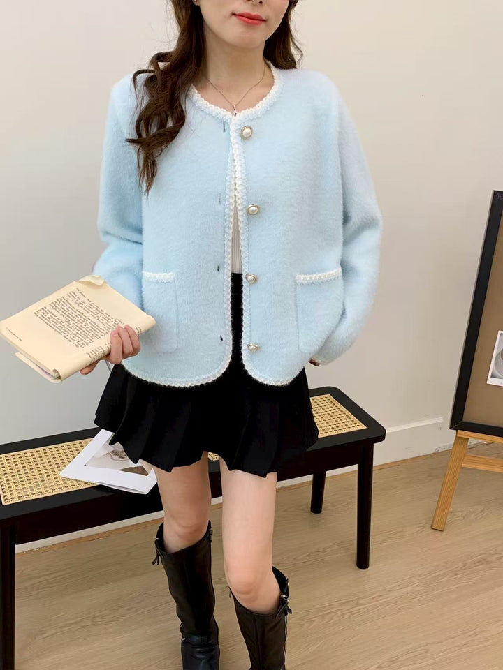 Cardigan féminin élégant avec patte de boutonnage décorative et poches