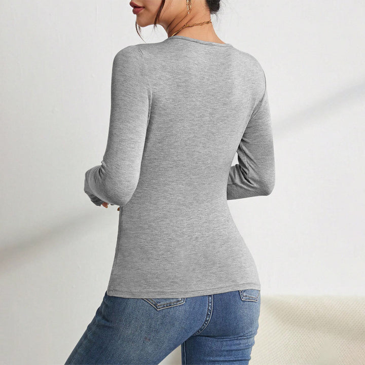 Body à manches longues pour femme avec décolleté en V tendance et détails raffinés aux épaules Chic & Stil