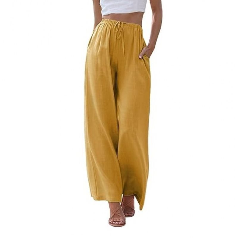 Wide palazzo pants for women with elastic waistband and side pockets Lune London