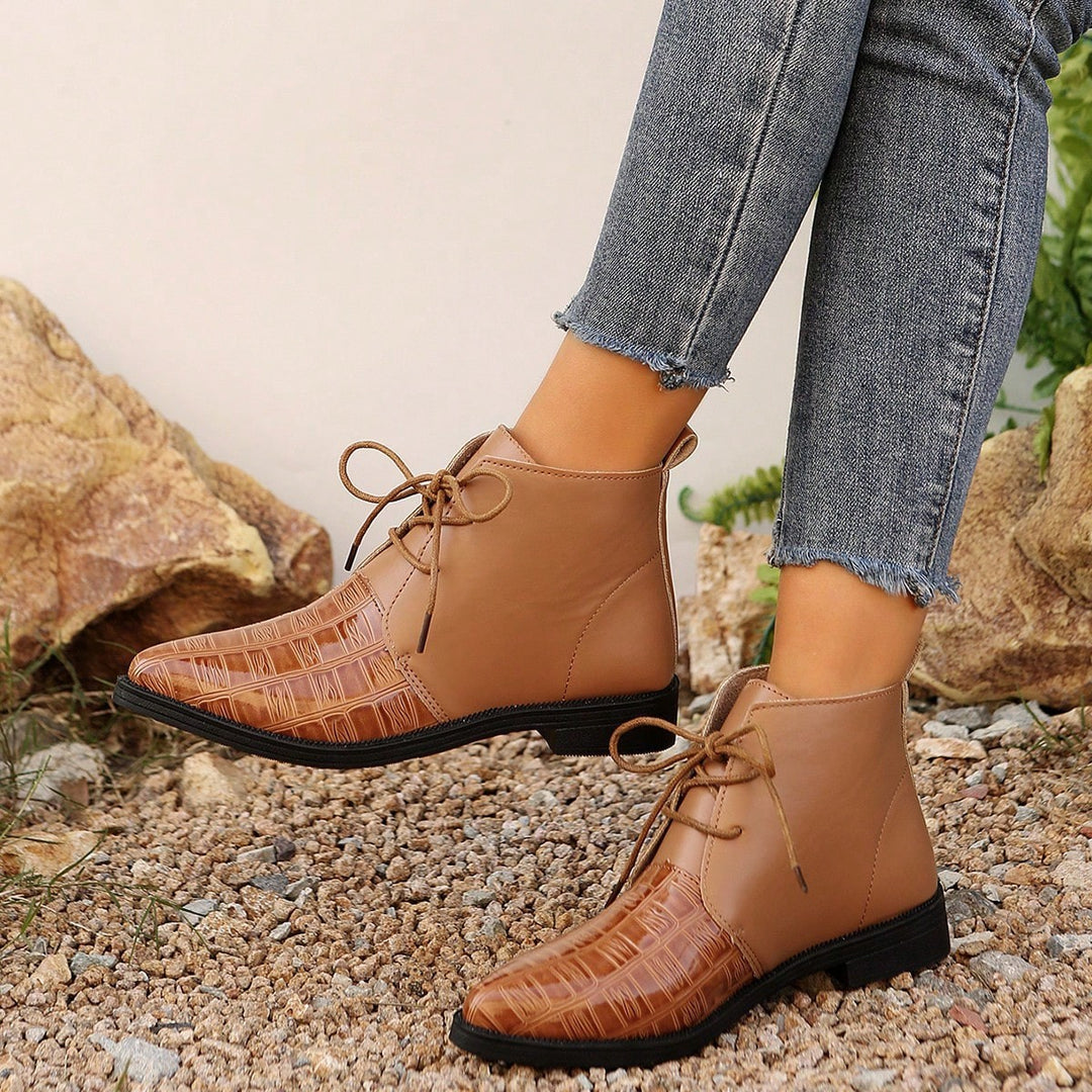 Fashion leather ankle boots for women with shiny accents and laces Lune London