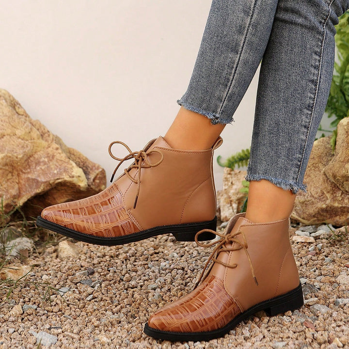 Fashion leather ankle boots for women with shiny accents and laces Lune London