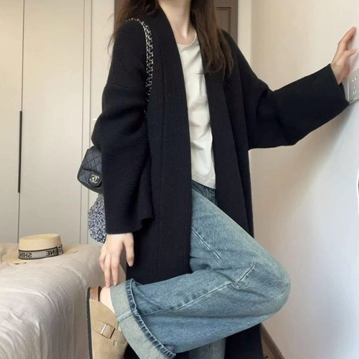 Manteau long en tricot pour femmes avec larges manches et texture douce Chic & Stil