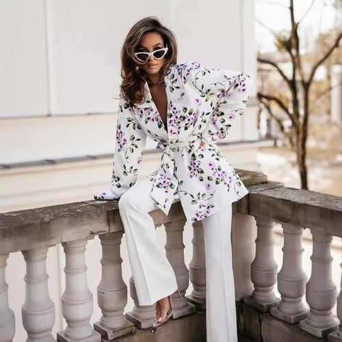 Wrap blouse for women with an elegant leopard pattern and long puff sleeves Lune London