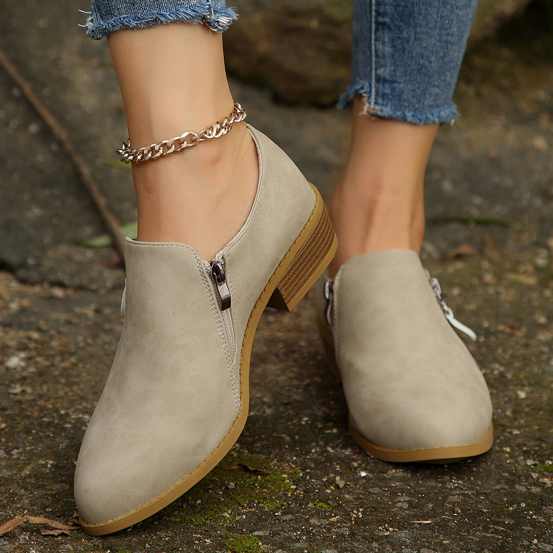 Trendy ankle boots for women with a chic zipper design Lune London