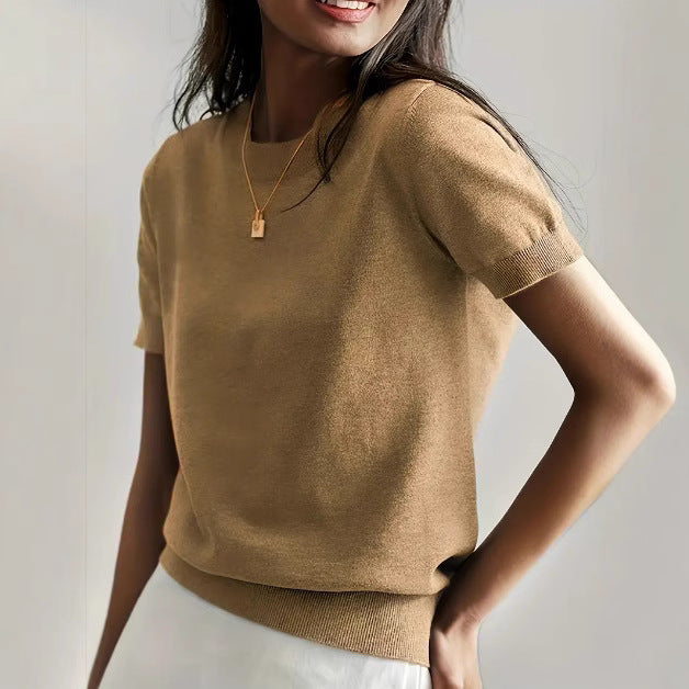 Fine knit sweater for women with a short sleeve silhouette and a soft fluid material Elegance and style