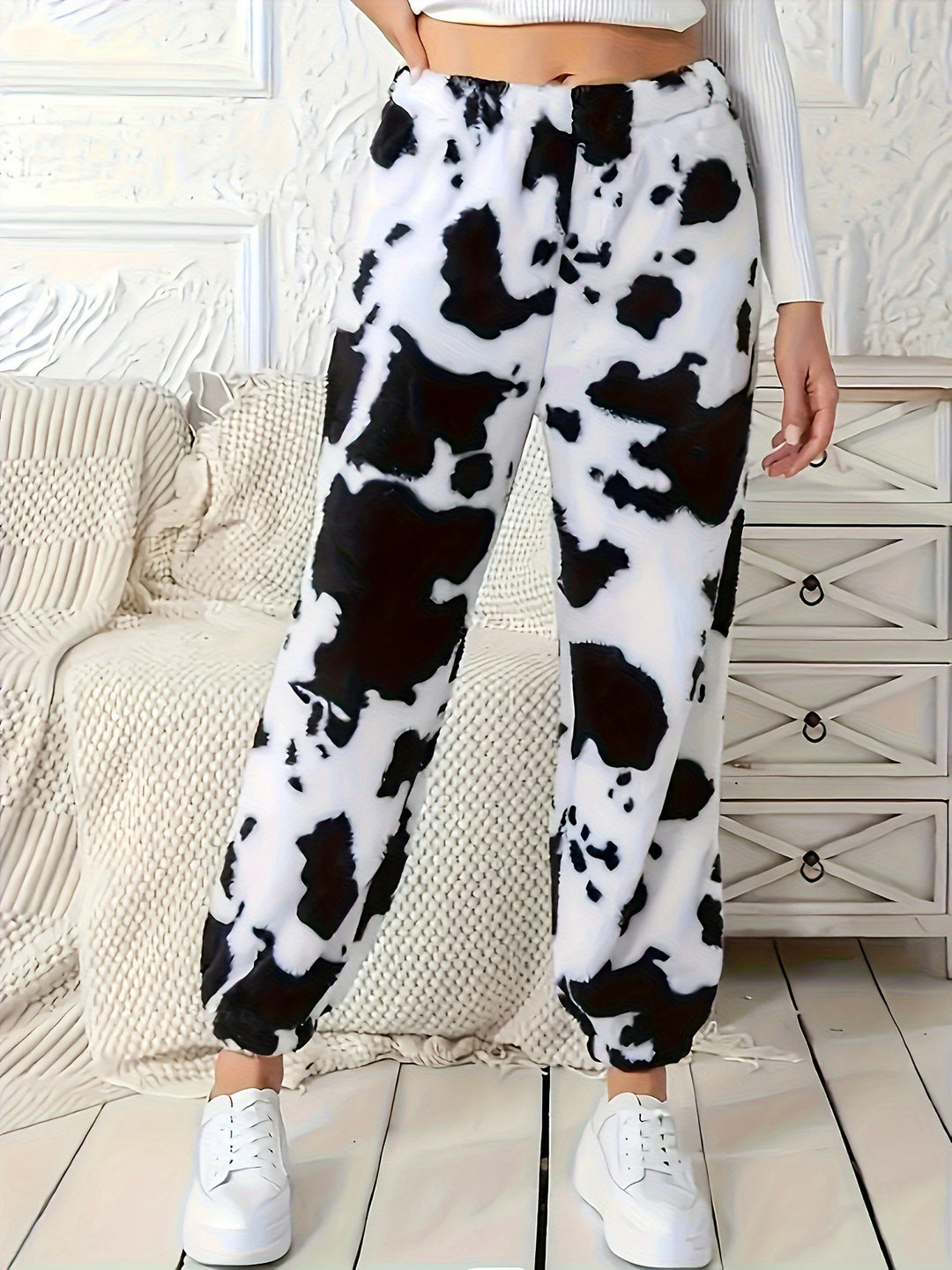 Trendy and comfortable jogger pants for women with cow pattern Lune London
