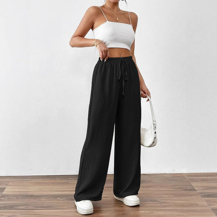 Loose linen pants for women with elastic waist and side pockets Lune London