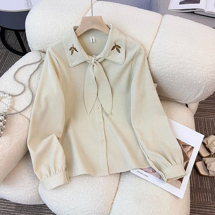 Blouse élégante pour femmes avec col en nœud Chic & Stil