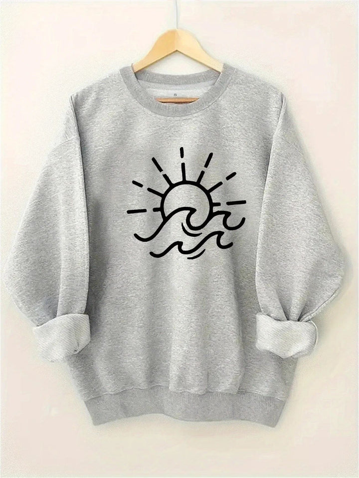 Sweat-shirt pour femmes avec un design créatif de soleil et de vague Chic & Stil